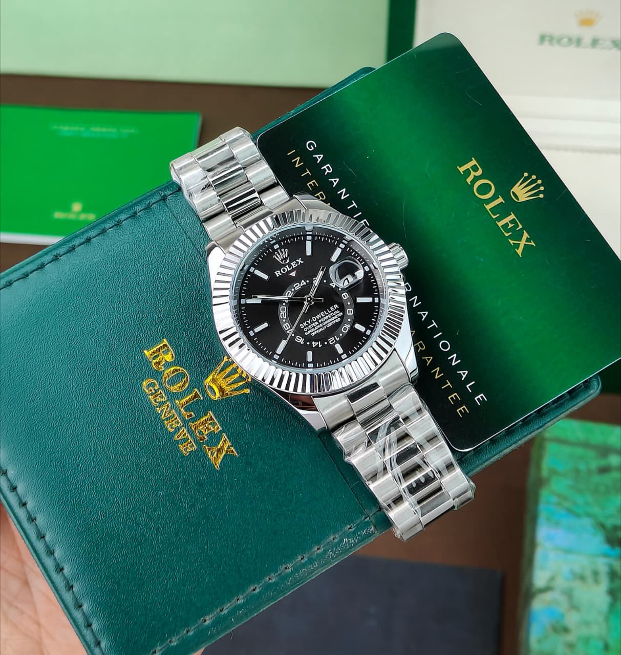 ROLEX SKY-DWELLER OYSTER CASE AN ANNUAL CALENDAR AND DUAL TIME ZONE DISPLAY
