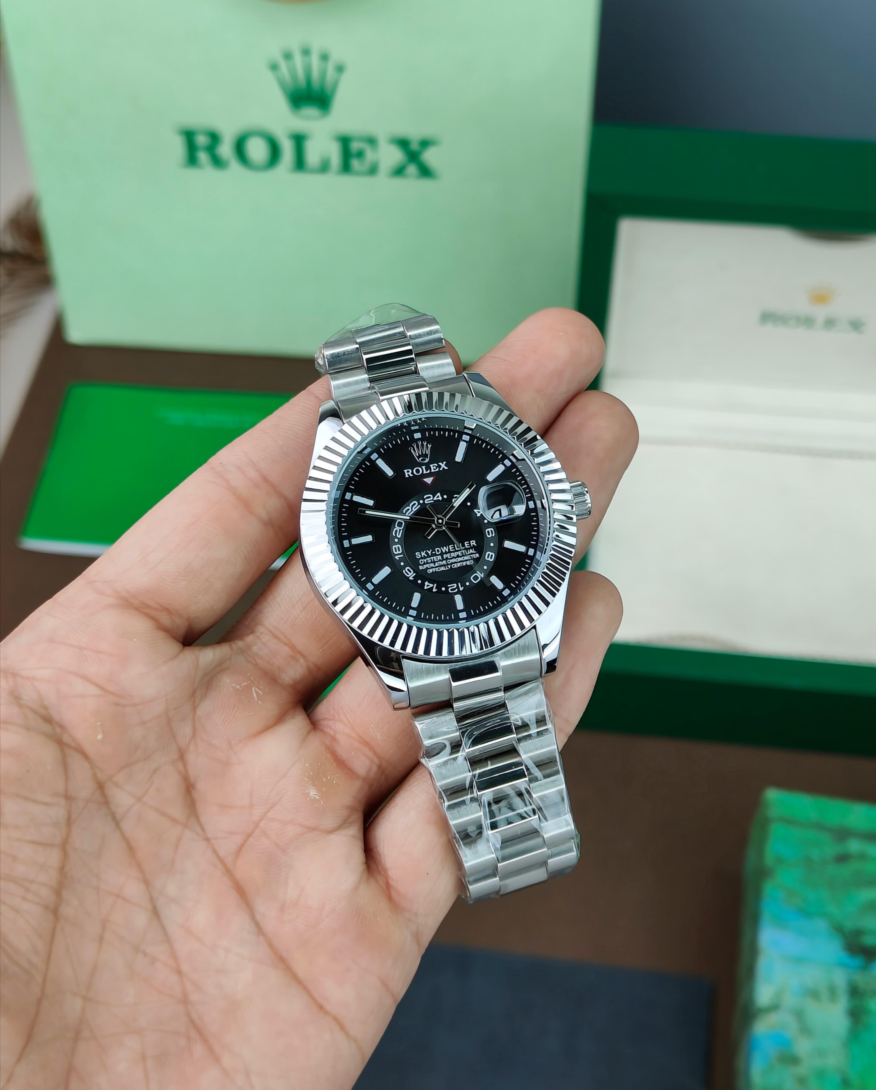 ROLEX SKY-DWELLER OYSTER CASE AN ANNUAL CALENDAR AND DUAL TIME ZONE DISPLAY