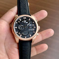 TAG HEUER CARRERA CALIBRE 1887 WATCH A ROSE GOLD-TONE CASH A BLACK DIAL AND BLACK STRAP